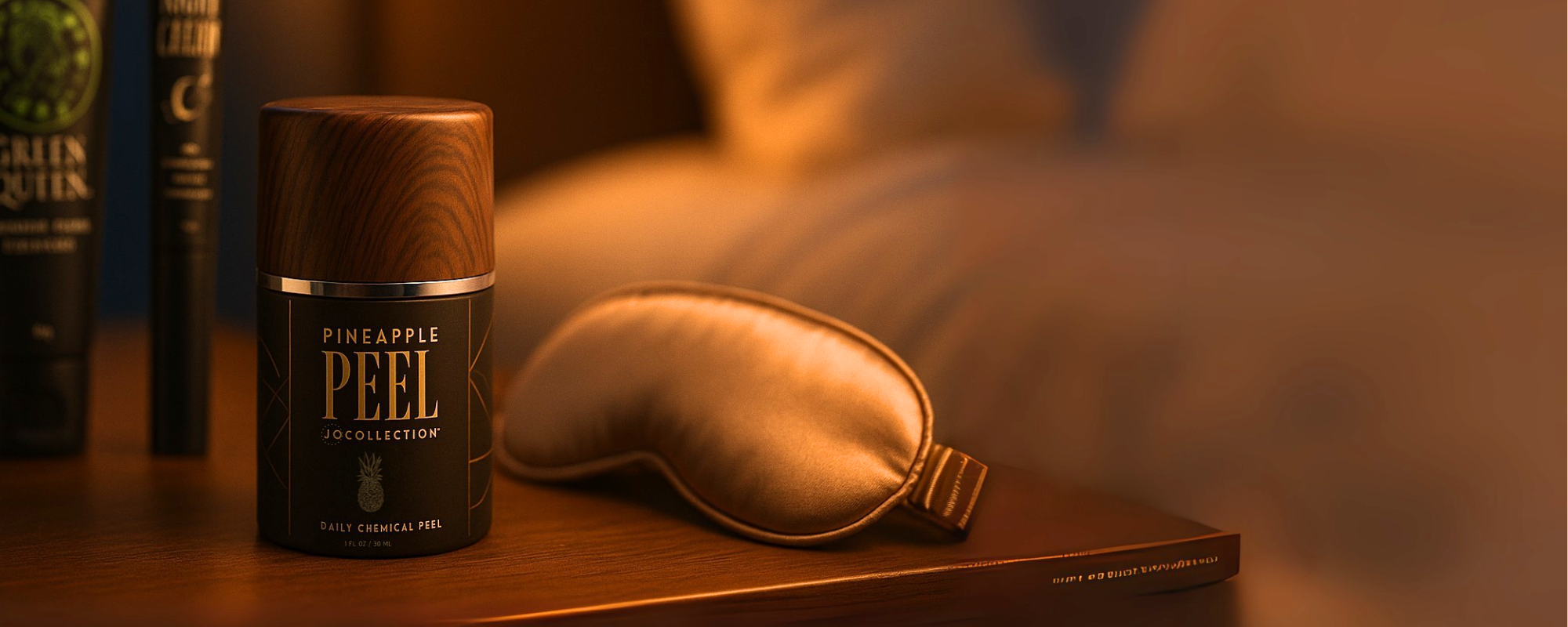 Pineapple Peel product with a sleep mask on a wooden surface