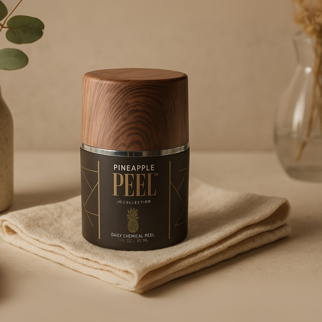 Jo Collection Pineapple Peel Daily Glycolic Acid Exfoliant Bottle on Vanity