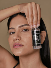 woman holding Twin Rose refreshing rosewater facial mist