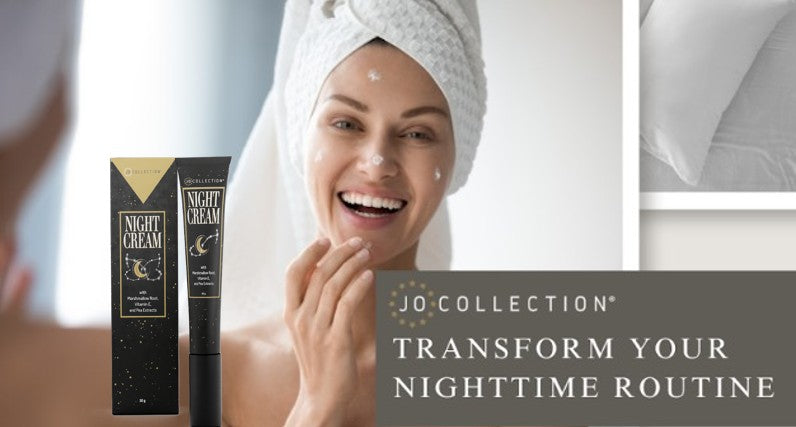 Smiling woman with a towel on her head applying Jo Collection hydrating night cream