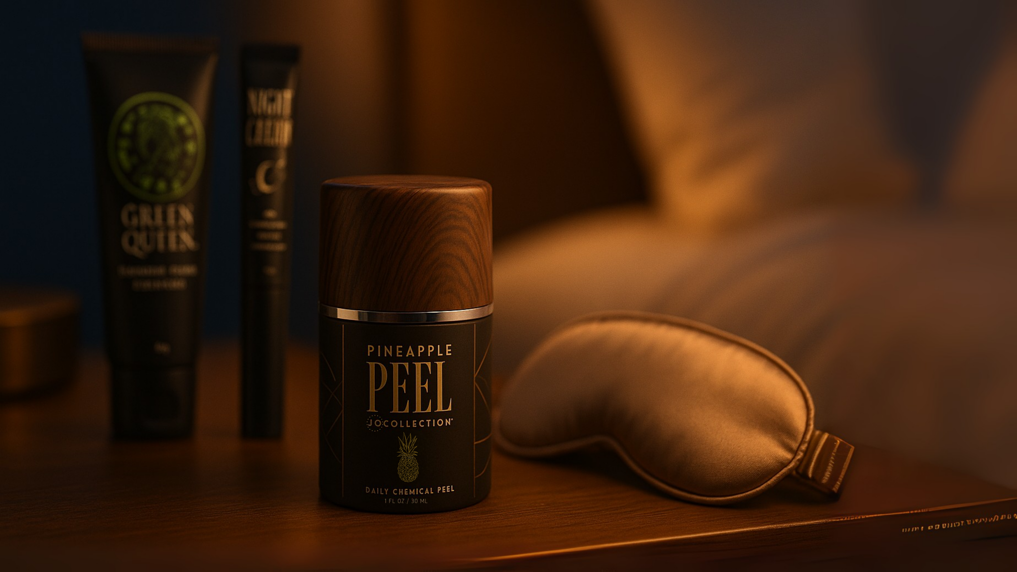 BHA facial exfoliator skincare product and a sleep mask on a wooden surface with a warm glow.