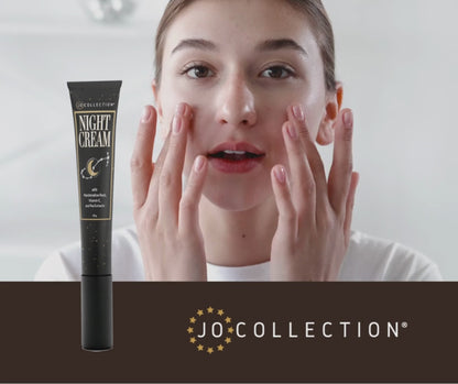 woman applying moisturizer to her face 